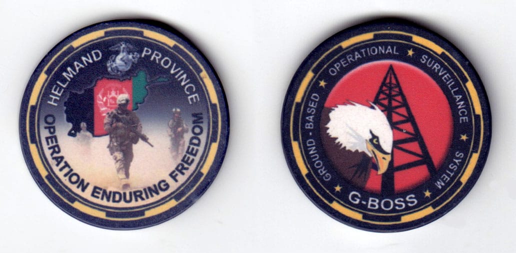 Round shaped poker chip, yellow & dark blue, 1 5/8 inches in diameter.