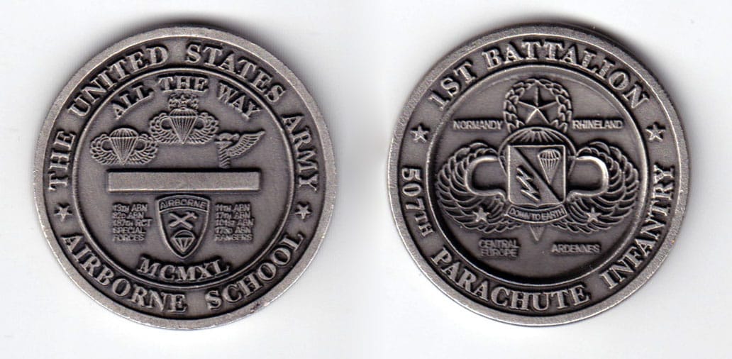 Round shaped coin, antique pewter in color, 1 5/8 inches in diameter.