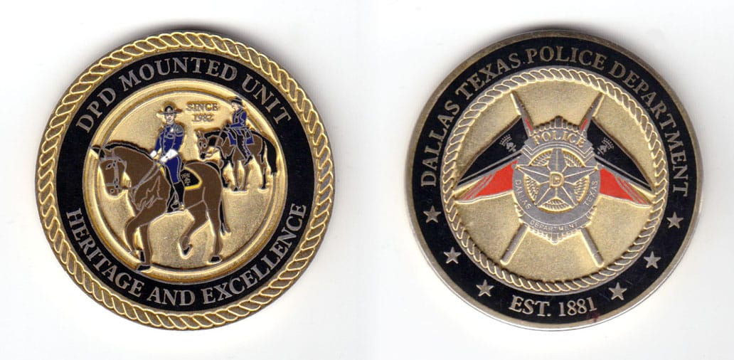 Round shaped coin, brass in color, 1 3/4 inches in diameter.