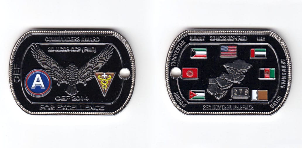 Rectanguler coin with long axis horizontal and short ends arched, pewter in color, 1 3/4 inches high & 2 inches wide.