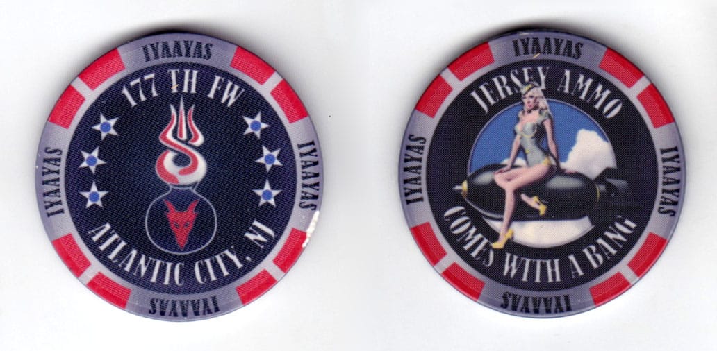 Round shaped poker chip, red & gray in color, 1 5/8 inches in diameter.