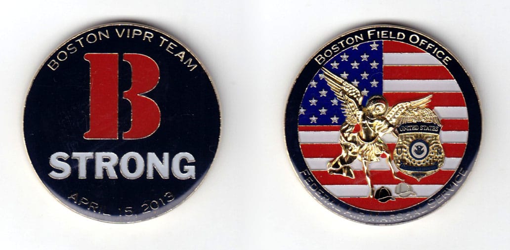 Round shaped coin, brass in color, 1 3/4 inches in diameter.