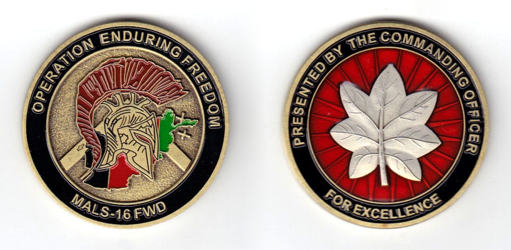 Round shaped coin, antique brass in color, 1 3/4 inches in diameter.