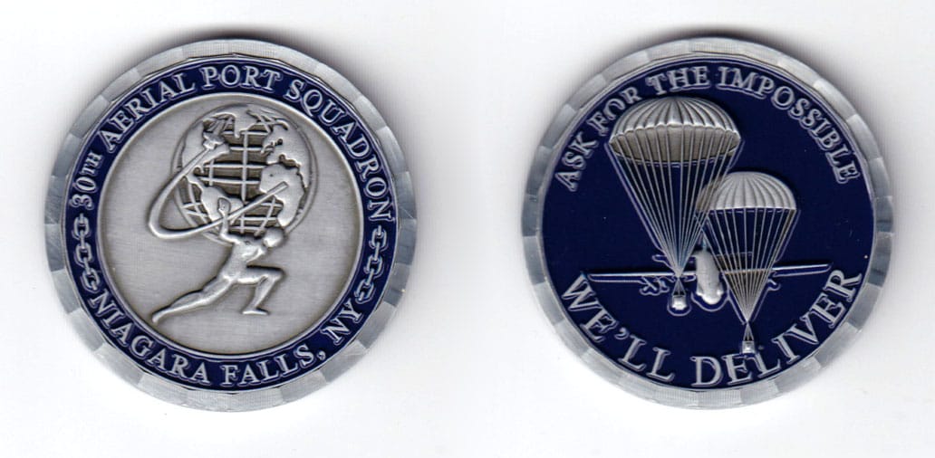 Round shaped coin, pewter in color, 1 3/4 inches in diameter.