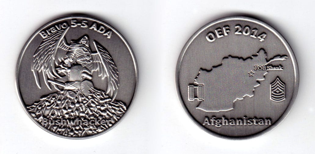 Round shaped coin, pewter in color, 1 3/4 inches in diameter.