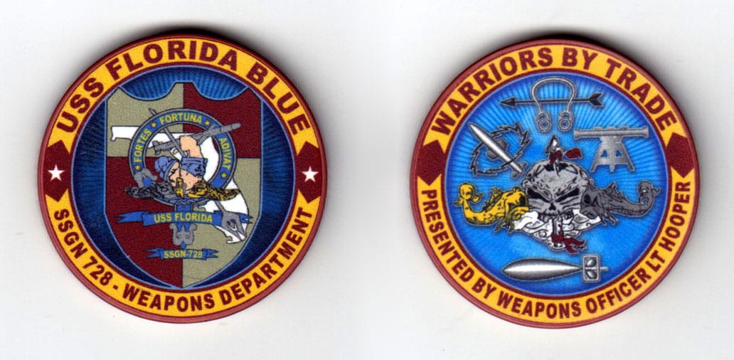 Round shaped poker chip, maroon & yellow in color, 1 3/4 inches in diameter.