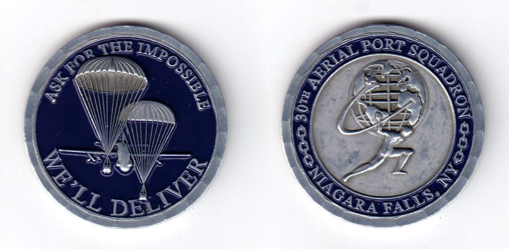 Round shaped coin, pewter in color, 1 3/4 inches in diameter.