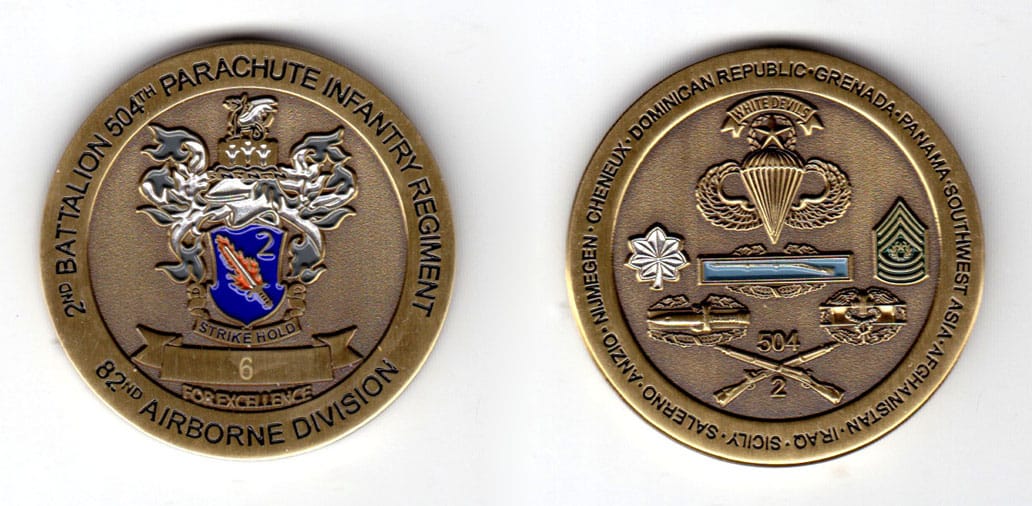 Round shaped coin, antique brass in color, 1 3/4 inches in diameter.