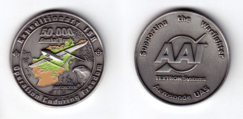 Round shaped coin, pewter in color, 1 3/4 inches in diameter.