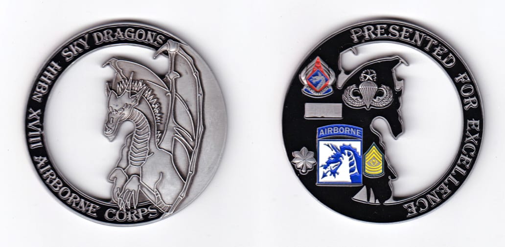 Circular shaped banner with dragon inset, antique pewter in color, 2 1/2 inches in diameter.