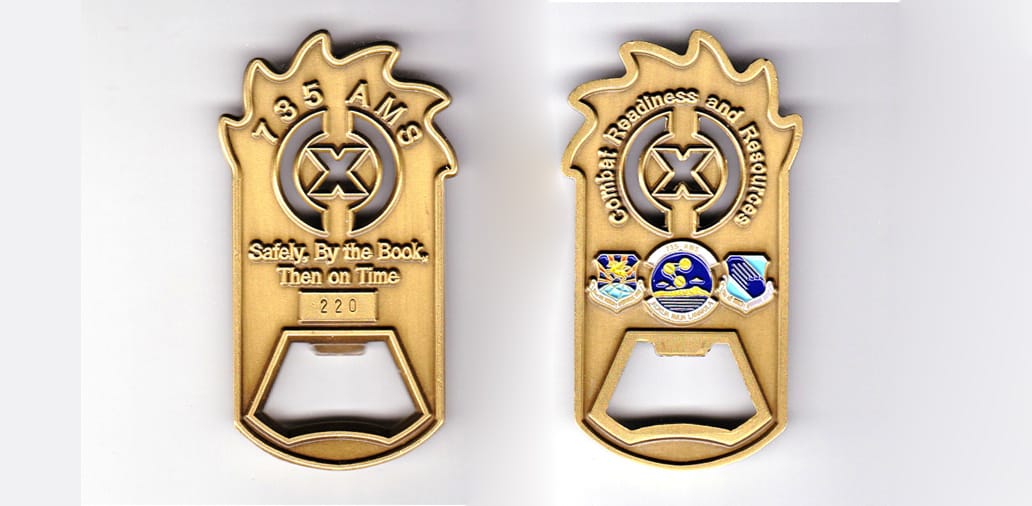 Rectangular shaped bottle opener with axis vertical, top edge Saw toothed and bottom edge arched, 2 3/4 inches high x 1 ...