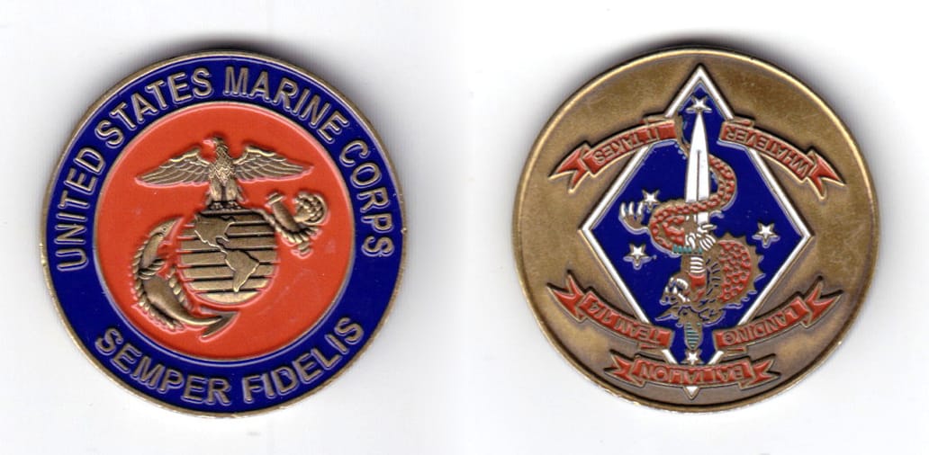 Round shaped coin, antique brass in color, 1 1/2 inches in diameter.