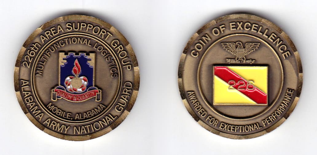 Round shaped coin, antique brass in color, 1 1/2 inches in diameter.