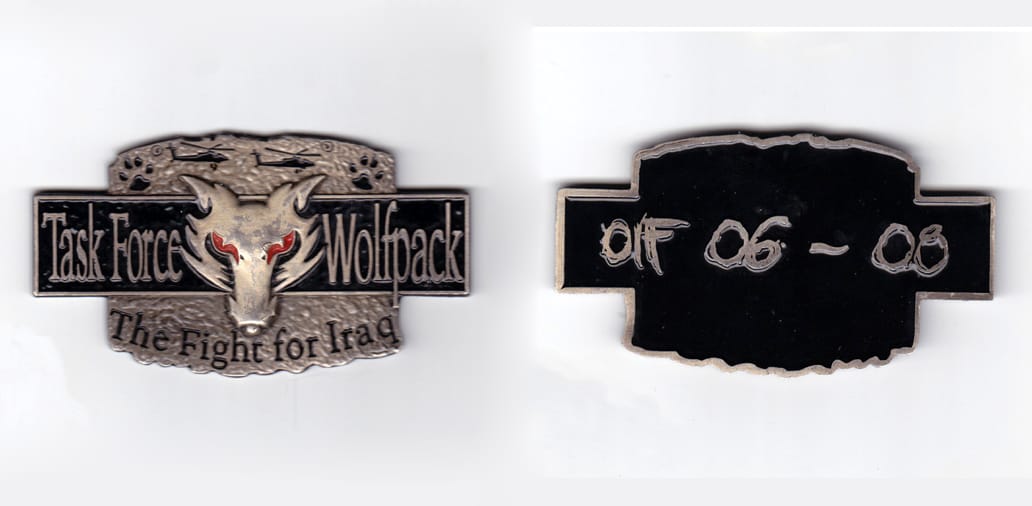 Rectangular shaped coin horizontal orientation with banners above and below, pewter in color, 1 3/4 inches high x 3 1/4 ...