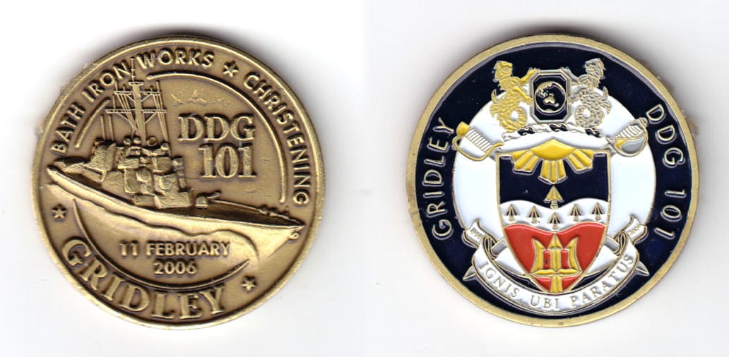 Round shaped coin, antique brass in color, 1 1/2 inches in diameter.