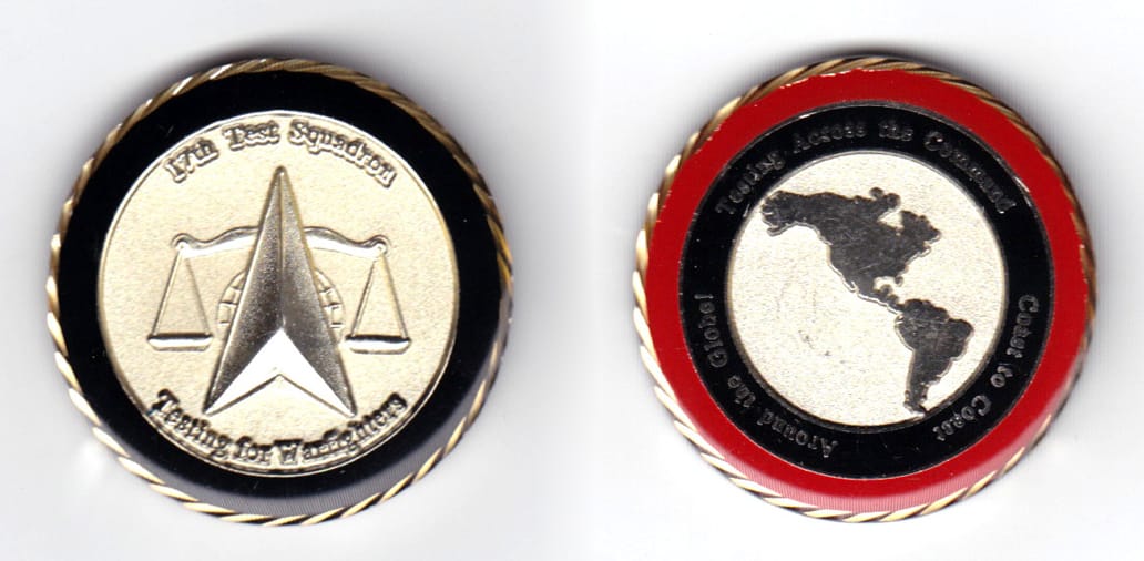 Round shaped coin, pewter in color, 1 1/2 inches in color.