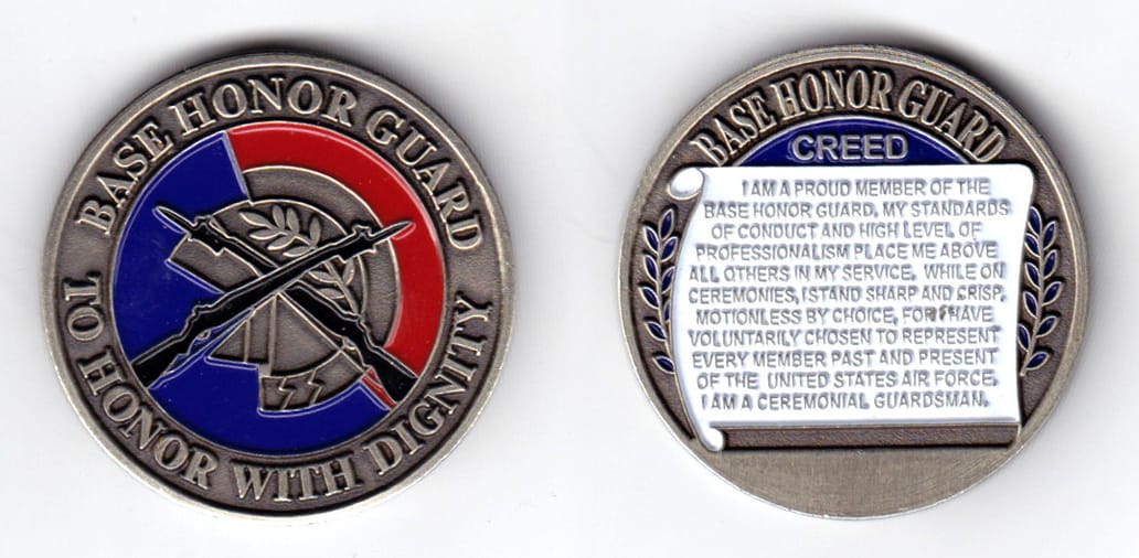 round shaped coin, antique pewter in color, 1 1/2 inches in diameter.