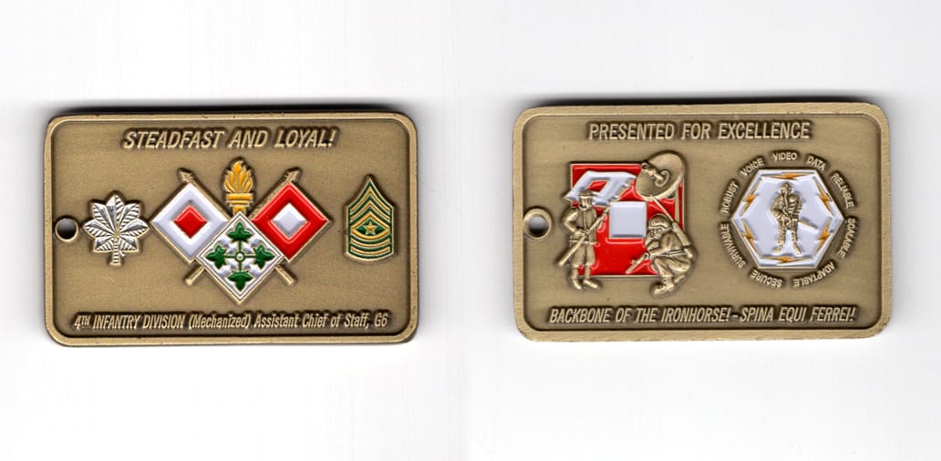 Rectangular shaped coin, antique brass in color, 1 1/4 inches high x 2 inches wide.