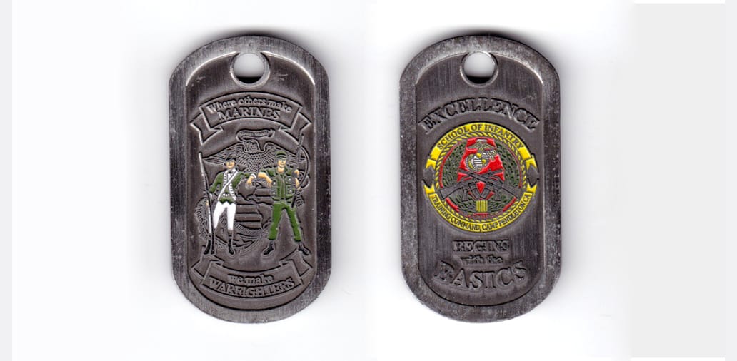 Dog tag shaped coin, antique pewter in color, 2 3/8 inches high x      1 3/8 inches wide