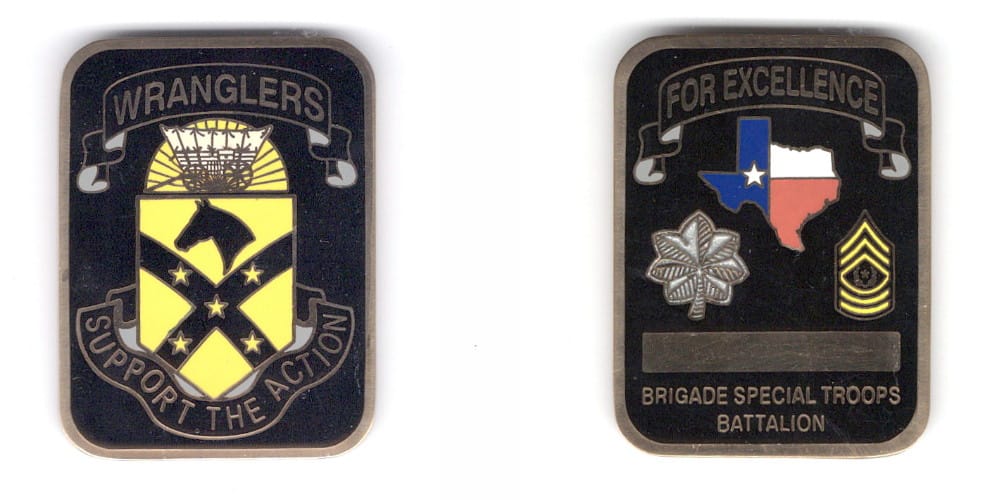 Rectangular shaped coin, brass in color, 2 inches high x 1 1/2 inches wide.