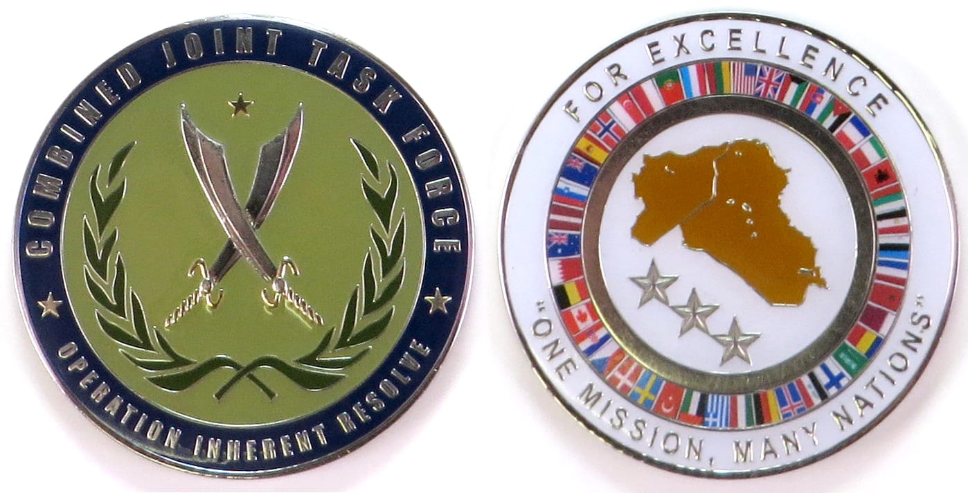 Round shaped coin, pewter in color, 2 1/2 inches in diameter.