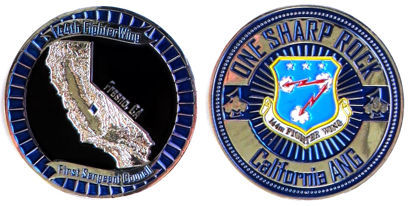 Round shaped coin, pewter in color, 1 3/4 inches in diameter.