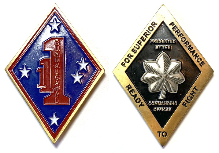 Diamons shaped brass colored coin, 2 1/2 inches high x 1 1/2 inches wide