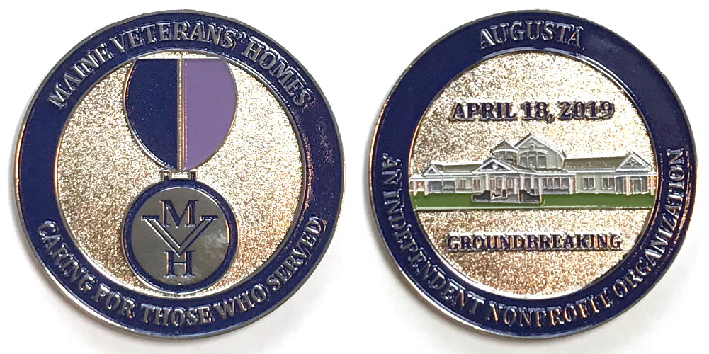 Round shaped coin, 2 inches in diameter, pewter in color