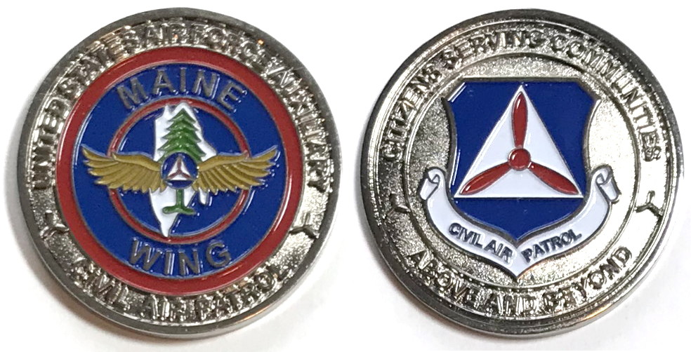 Round shaped coin, 1.75 inches in diameter, Pewter in color.