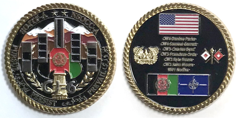 Round shaped coin, 1.75 inches in diameter, brass in color.