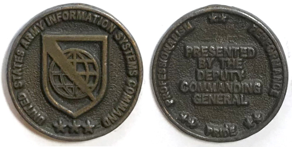 Round shaped coin, 1.5 inches in diameter, antique brass in color.